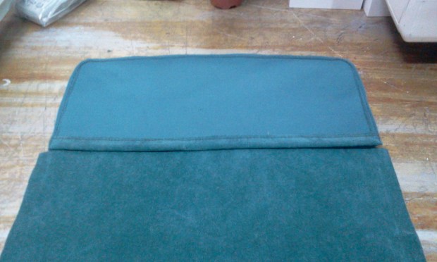 diy plastic file into suede clutch